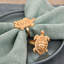 Ensemble de 4 anneaux de serviette en forme de tortue dorée avec coquille stylisée - Décoration de table de Noël élégante