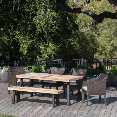 Aranson 6 - Person Acacia Wicker Patio Dining Set with Rectangular Table