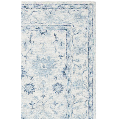 Lethe Oriental Handmade Tufted Wool Blue/Ivory Area Rug