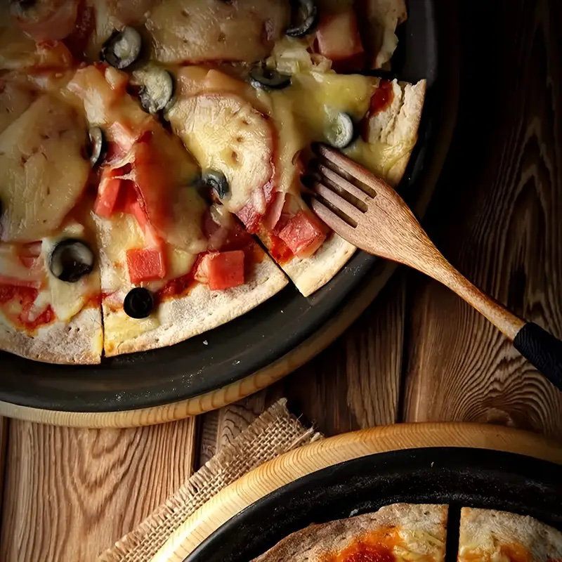 Cuisinox 13" Non-Stick Carbon Steel Perforated Pizza Pan