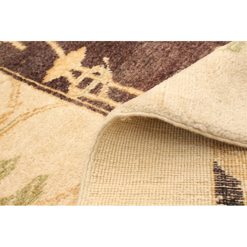 Tapis brun foncé / ivoire en laine noué à la main