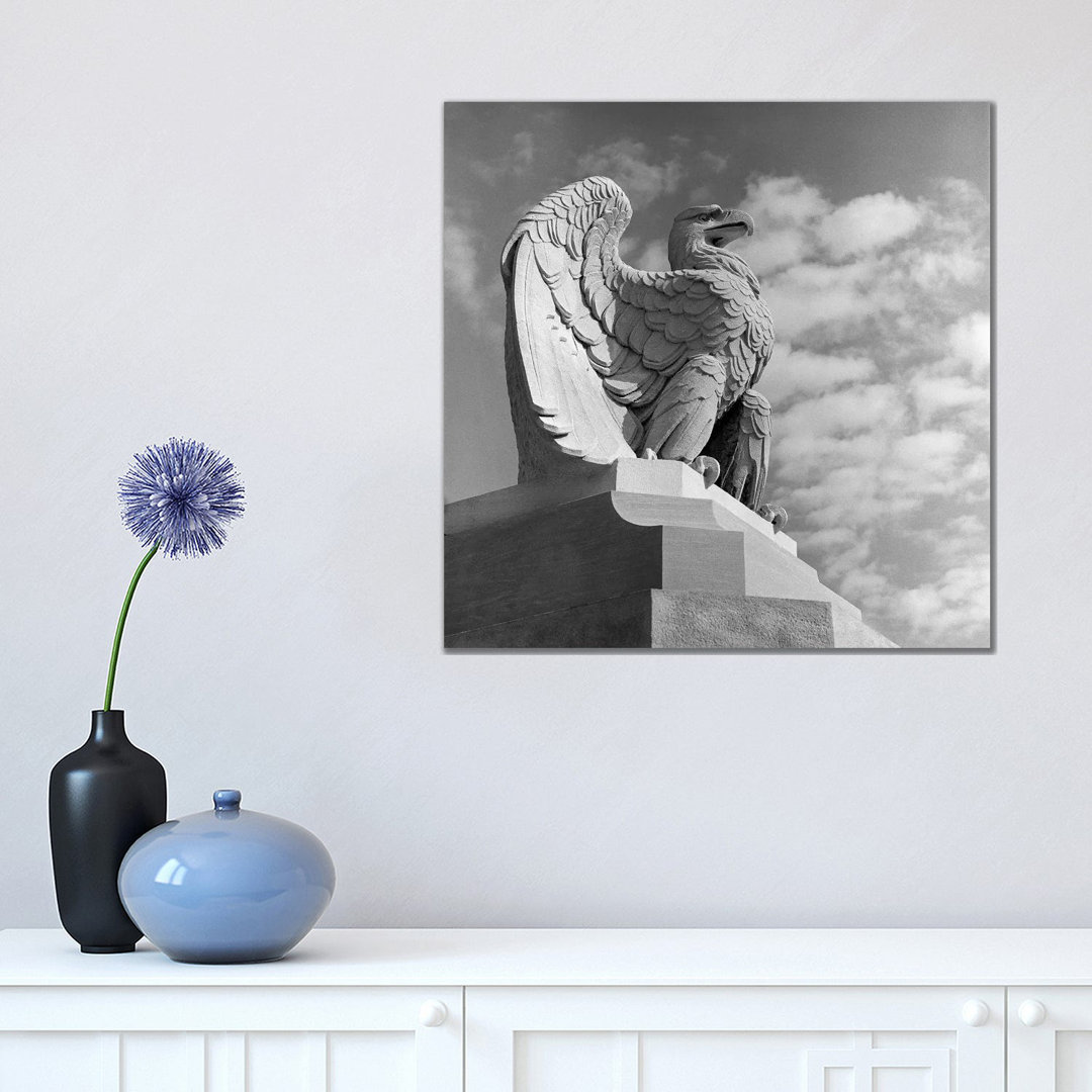 1960s Eagle Statue Against Sky Clouds Wings Spread Feathers by Vintage Images - Wrapped Canvas Print