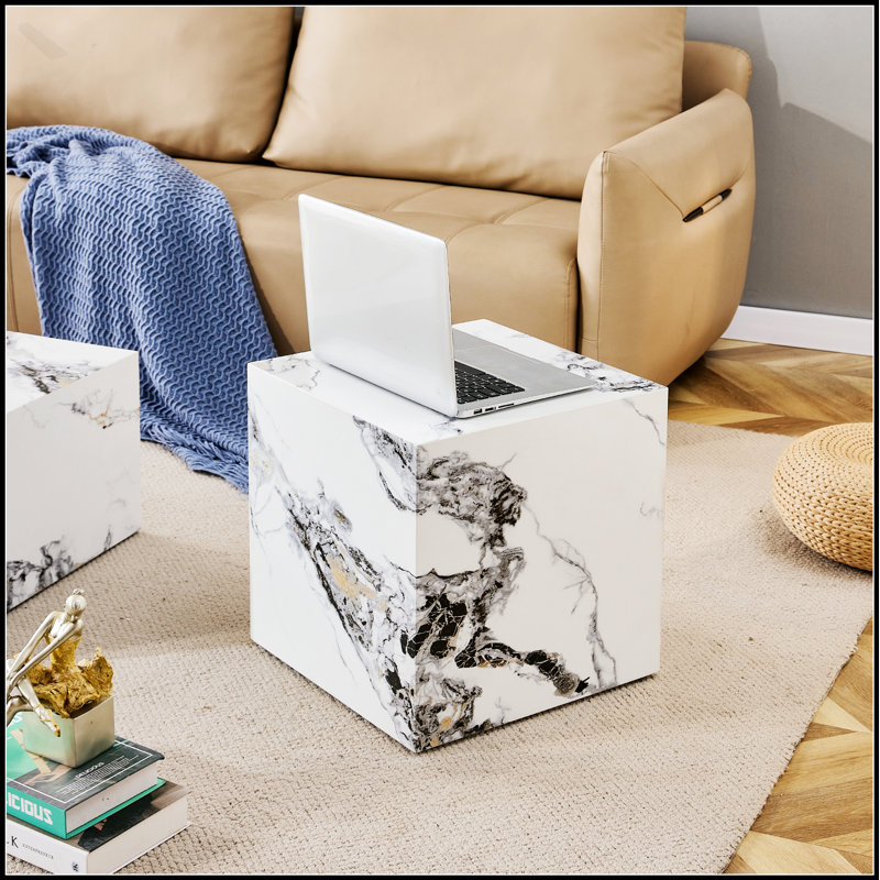 Table basse moderne en bois aggloméré blanc avec un design texturé élégant pour des espaces de vie compacts