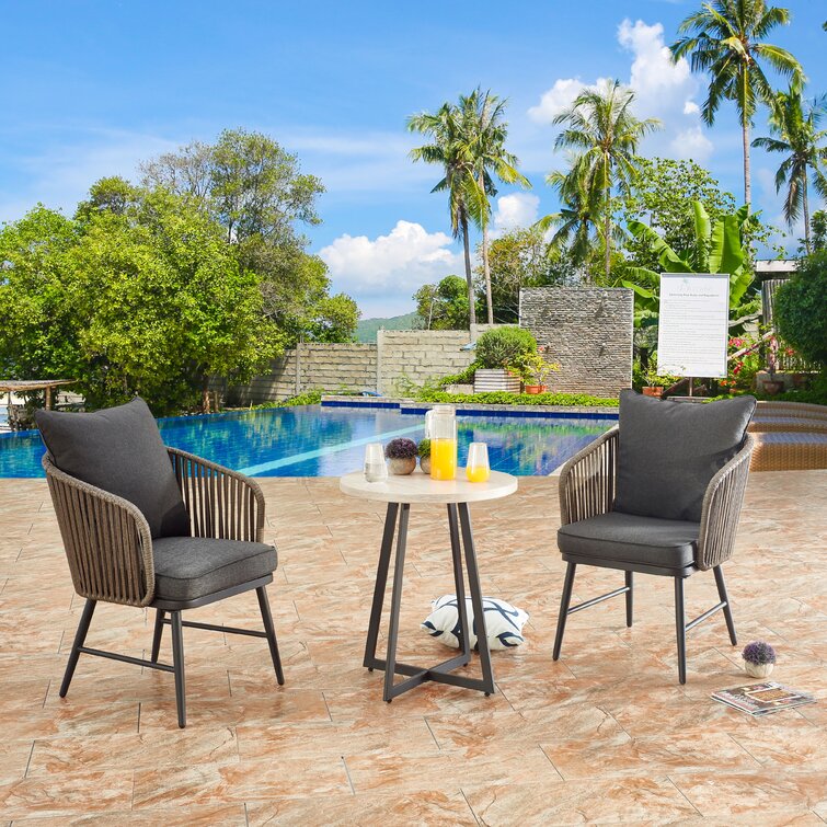https://assets.wfcdn.com/im/89432039/resize-h755-w755%5Ecompr-r85/1188/118852739/Inklen+3+Piece+Rattan+Seating+Group+with+Cushions.jpg