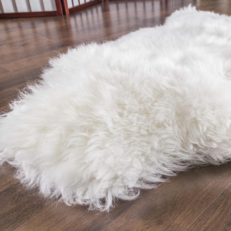 Tapis zone ivoire naturelle en peau mouton