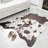 Ganote Animal Print Faux Cowhide Area Rug-649386223-584485139