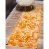 Sandrine Ikat Area Rug in Orange