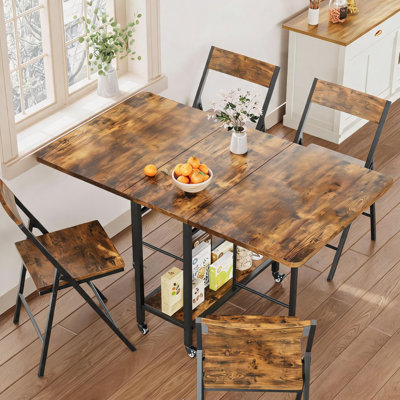 Ensemble table et chaises pliantes pour 4 personnes, avec abattants et 4 chaises pivotantes pliantes, idéal pour les petits espaces, appartements, cuisines et salles à manger.