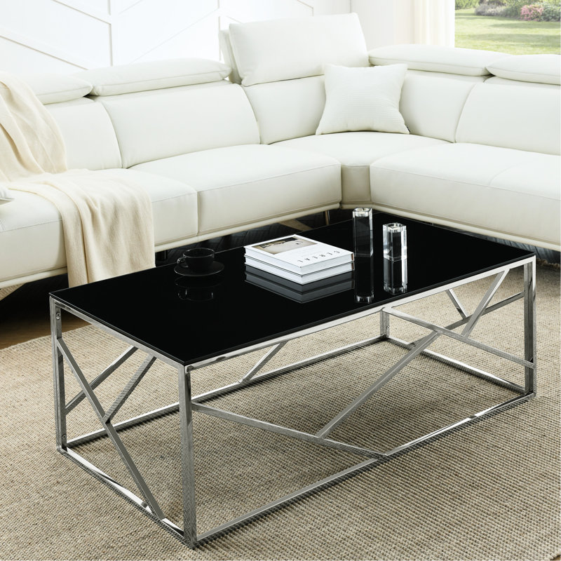 Table basse élégante et moderne avec plateau en verre trempé et structure en acier inoxydable, parfaite pour le salon et la chambre à coucher
