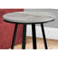 Table ronde élégante pour espaces de vie - Matériaux stratifiés gris et métal noir, style moderne, idéale pour une salle familiale.
