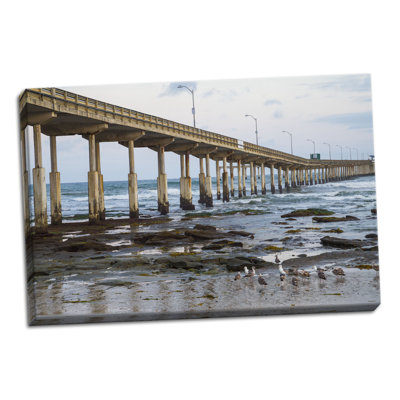 « ocean beach pilier i », reproduction de photo sur toile tendue