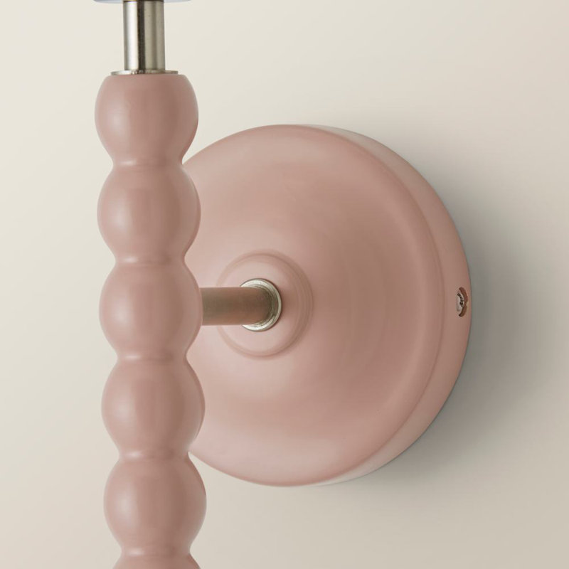 Alderic Manufactured Wood Armed Sconce, Pink
