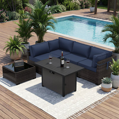 Ensemble de salon de jardin modulaire en rotin toutes saisons 4 personnes avec coussins et table foyer