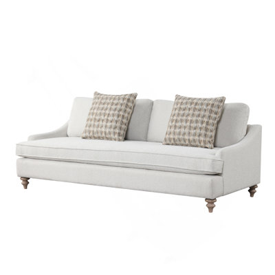 Canapé avec coussin réversible simple et 2 coussins