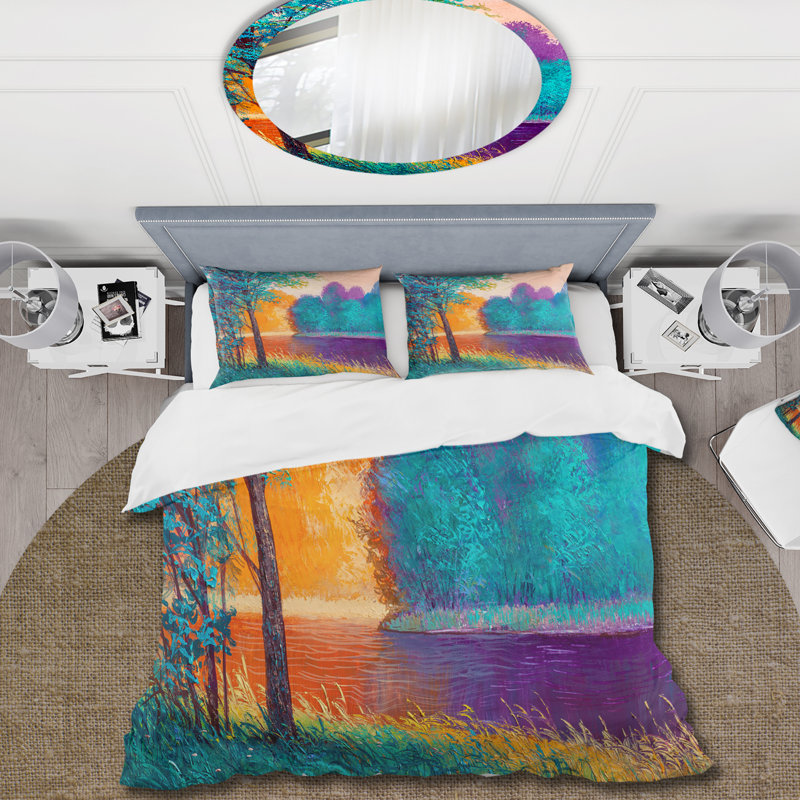 Ensemble de housse de couette en polyester coloré entre les arbres au crépuscule