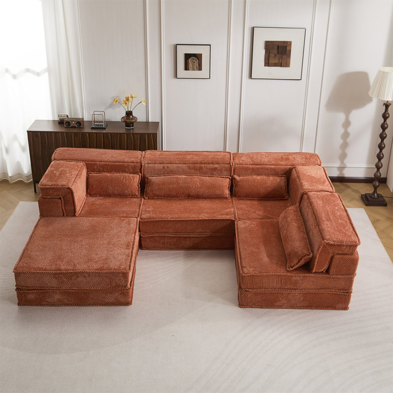 Canapé-lit convertible au sol avec conception modulaire, mousse à mémoire de forme haute densité et aucun assemblage requis pour une utilisation à domicile flexible.