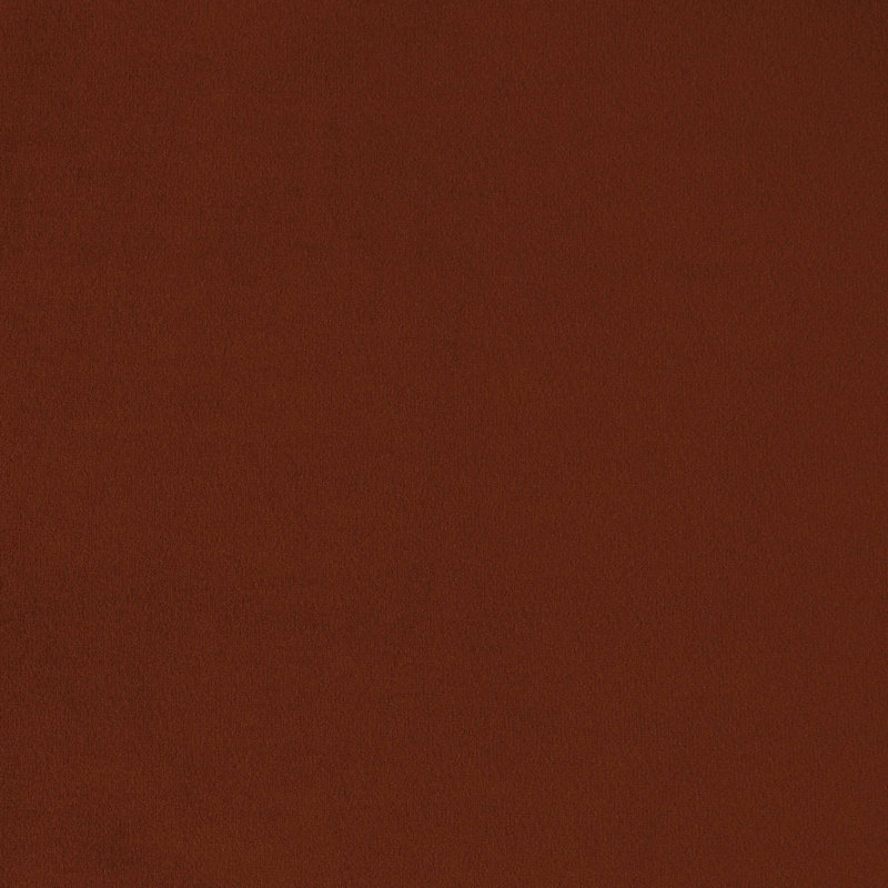 Fauteuil pivotant orange brûlé avec structure en bois et tissu dramatique pour une installation décontractée