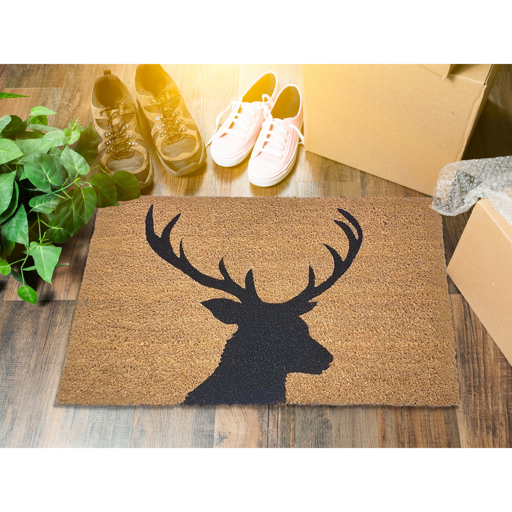 https://assets.wfcdn.com/im/89502203/compr-r85/2242/224211900/sheltered-coconut-door-mat-printed-reindeer-24x16-natural.jpg