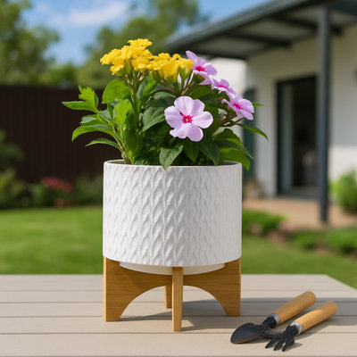 Pot à fleurs en céramique avec support Alyanah