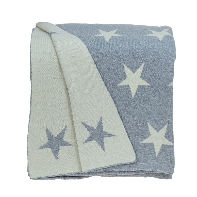 Jeté en tricot gris transitionnel