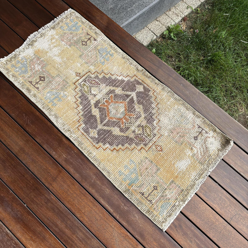 Vintage Small Turkish Rug in Rich Orange Tones Made of Antique Oushak Wool Ideal for Enhancing Your Living Room or Bedroom Decor