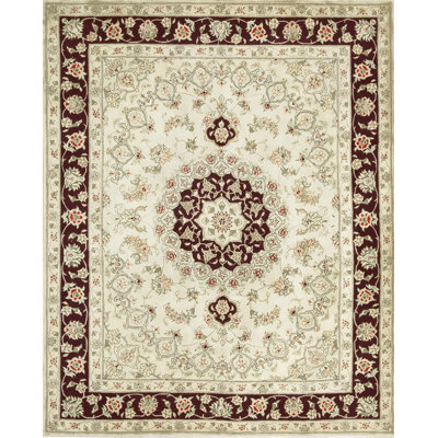 Tapis ivoire et vin noué à la main de haute qualité
