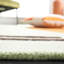 Tapis vert / orange / brun / ivoire en laine fabriqué à la main Arabelle-70712143