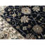 Tapis noir et ivoire de haute qualité noué à la main