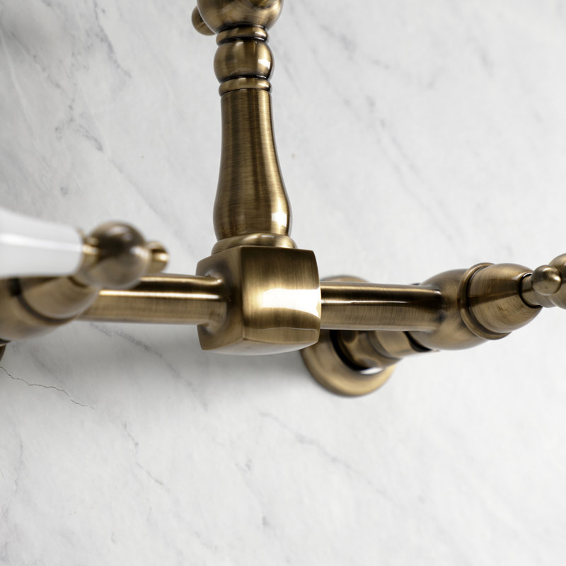 Kingston Brass Heritage Double-Handle 2-Hole Wall-Mount Bridge Kitchen Faucet, Vintage Brass