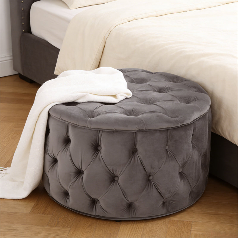 Repose-pieds en velours gris