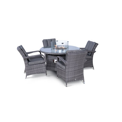 Pacheco 4 - Person Patio Dining Set Round Table with Cushions Included