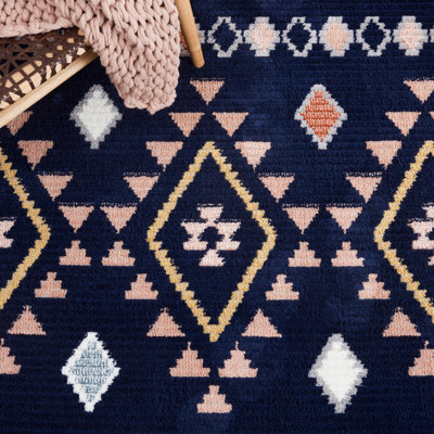 Baston Southwestern Navy/Orange/White Area Rug