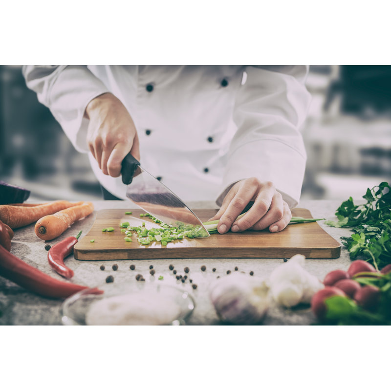 The Chef Slicing Vegetables by Scyther5 - Wrapped Canvas Print, 30cm H x 46cm W