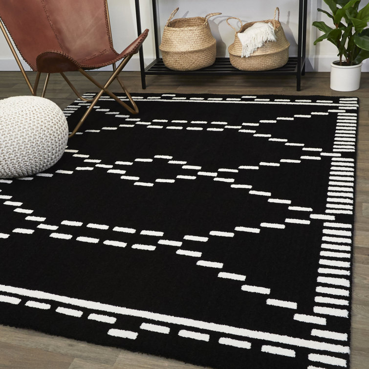 Tapis noir à motif géométrique Krantz