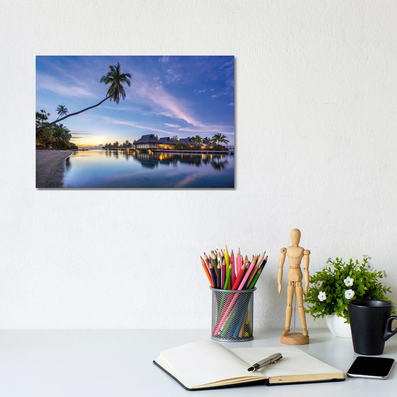 Sunset At A Luxury Beach Resort On Moorea, French Polynesia by Jan Becke - Wrapped Canvas Print