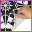 Tapis de bain noir et blanc Kaléidoscope-558829061