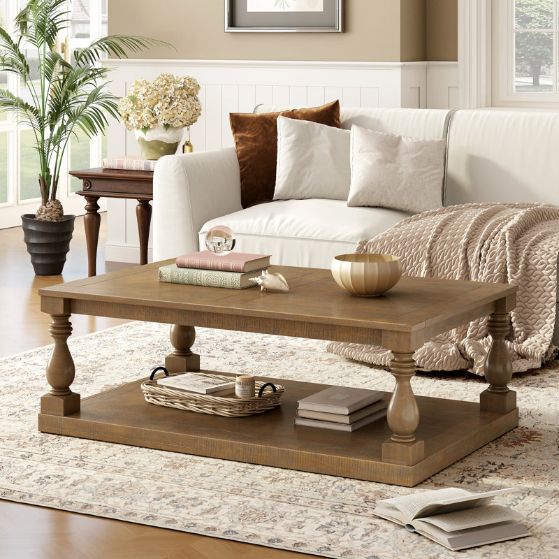 Table basse rétro avec pieds en colonne de style artistique et placage Armontae luxueux pour un charme intemporel, convenant au salon et à la salle d'étude