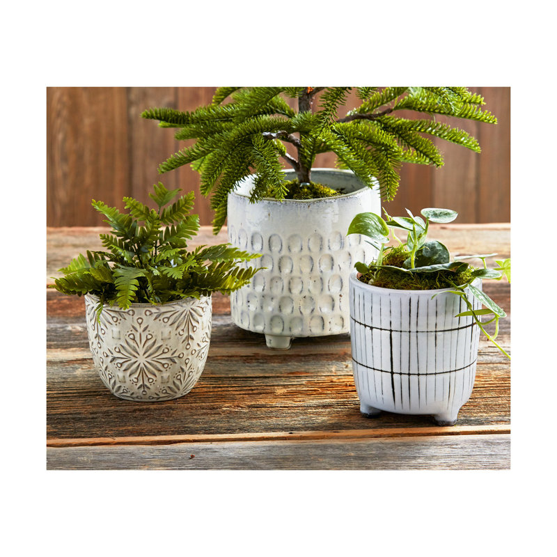 Empreinte de jardinière avec pieds larges