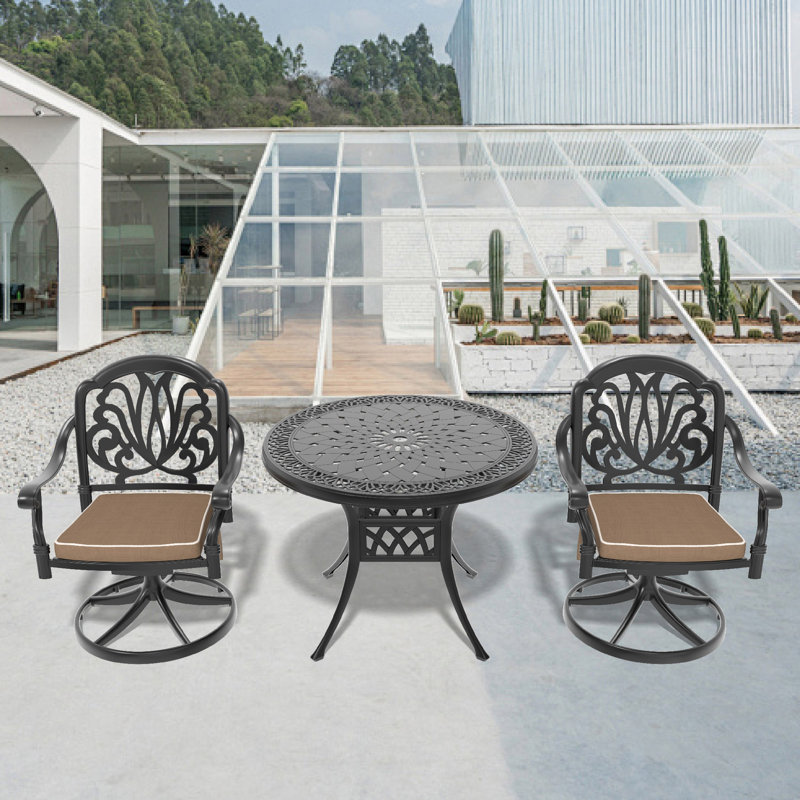 Cet ensemble de salle à manger en fonte d'aluminium toutes saisons comprend des chaises pivotantes et une table ronde avec cadre noir