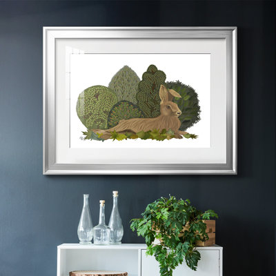Lièvre couché sur des feuilles, impression sur papier