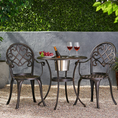 Bistro en fonte d'aluminium avec seau à glace - sièges d'extérieur de couleur cuivre teintés pour les loisirs