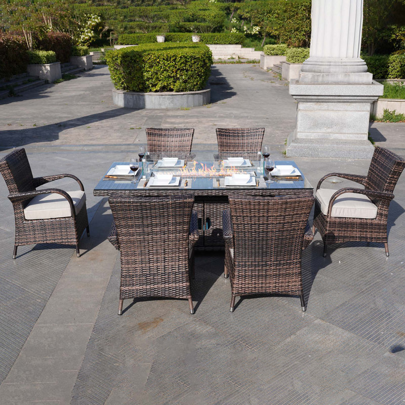Ardala 6 - Person Wicker Patio Dining Set with Rectangular Table , Cushions Included, Brown