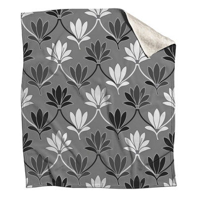 Couvertures à motifs floraux gris