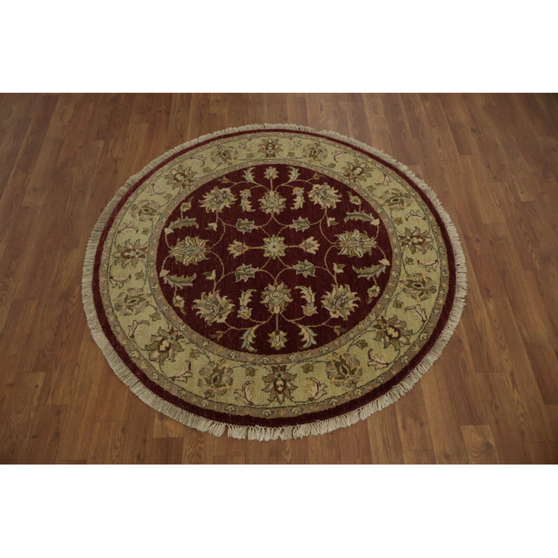 Tapis rond élégant avec motif floral complexe inspiré de la nature