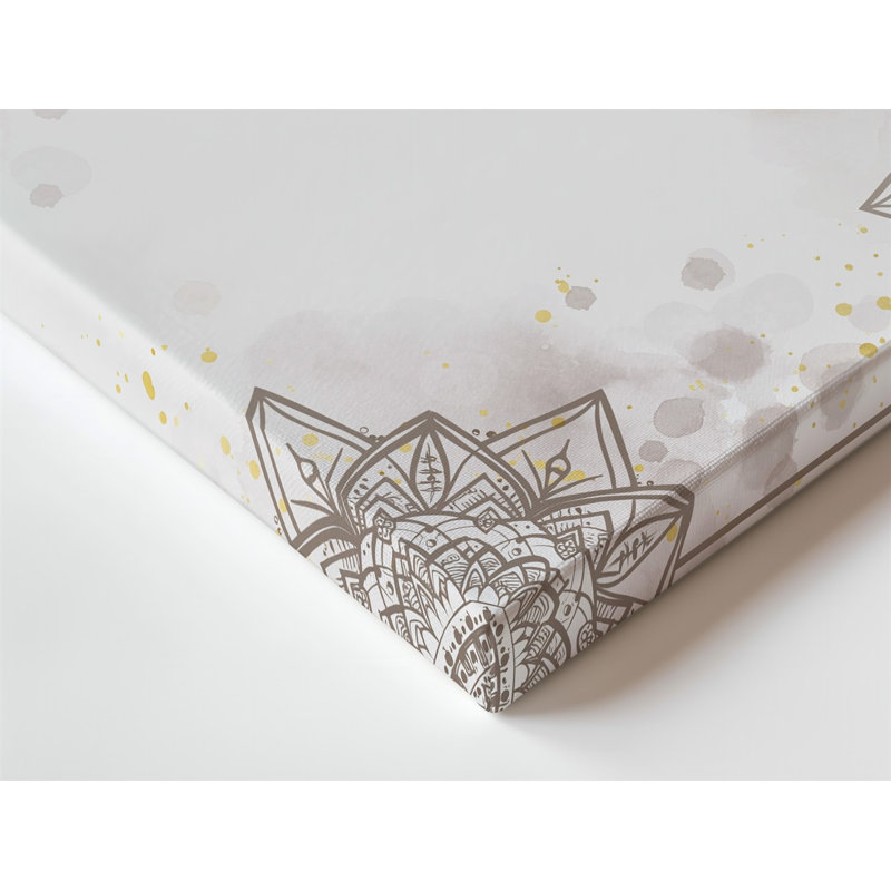 La toile crée un fond serein et élégant avec des motifs d'art délicats complexes de mandala dans des tons beiges doux