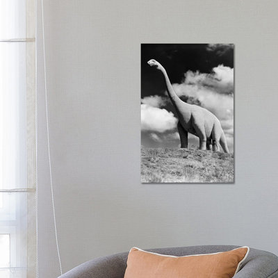 1950s Life-Size Statue Of Extinct Long Neck Gigantic Brontosaurus by Vintage Images - Wrapped Canvas Print