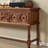 Wall-mounted carved storage cabinet for entryway