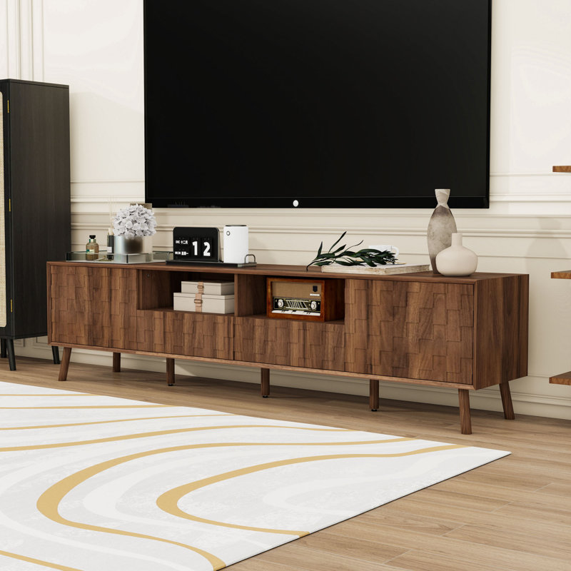 Meuble télé moderne avec charnières à fermeture douce, pieds en bois massif, bord biseauté et motif carré texturé