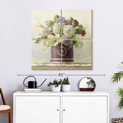 Harnek tulipes dans une boîte à chapeaux aubergine
