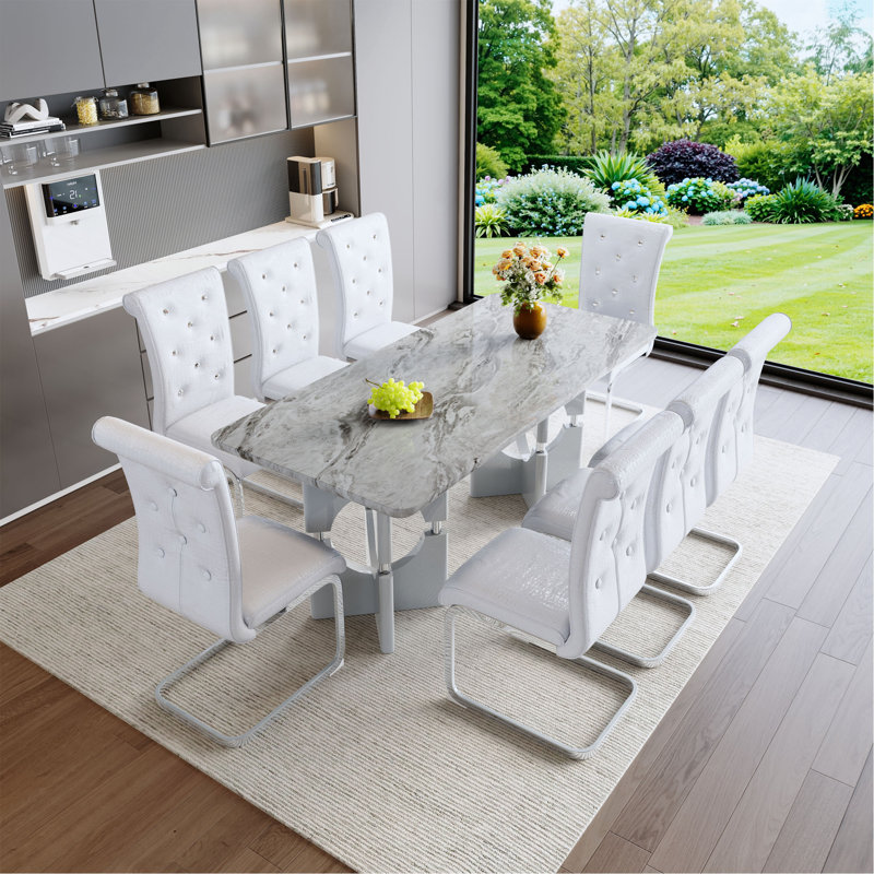 Ensemble de table et de salle à manger moderne 9 pièces, table en panneau de fibres à densité moyenne avec chaises rembourrées et pieds en métal